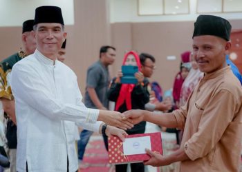 Baznas Kabupaten Solok Serahkan Santunan