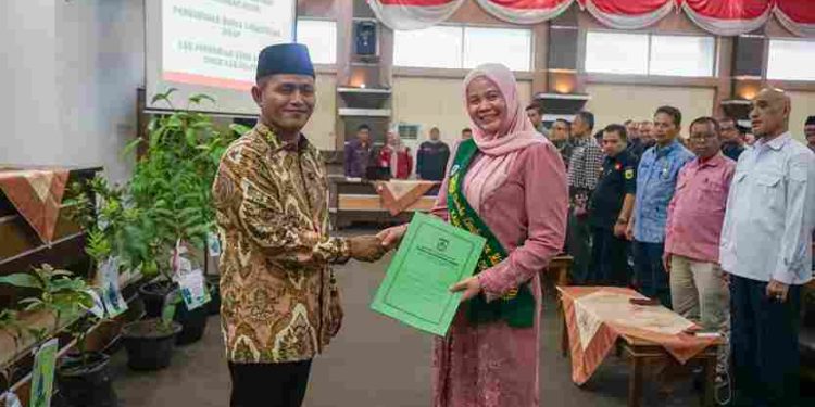 Bupati Solok membuka Rakor Lingkungan Hidup serta Pengukuhan Bunda Lingkungan Hidup dan Launcing Bank Sampah Induk di Kabupaten Solok